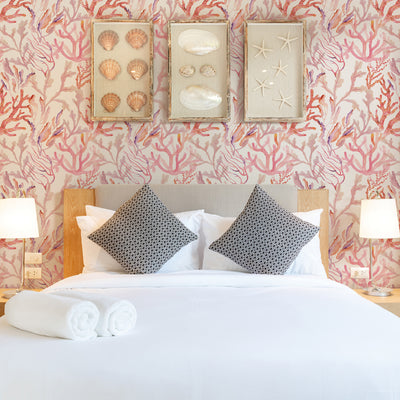 Coral Reef Removable Wallpaper - A bedroom featuring Tempaper's Coral Reef Peel And Stick Wallpaper in rose quartz | Tempaper#color_rose-quartz