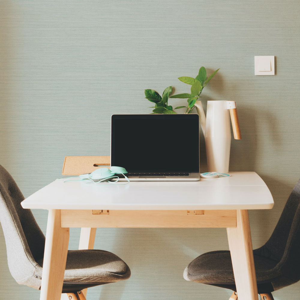 Faux Horizontal Grasscloth Removable Wallpaper - A workspace with two chairs and a computer featuring Faux Horizontal Grasscloth Peel And Stick Wallpaper in textured seaglass | Tempaper#color_textured-seaglass