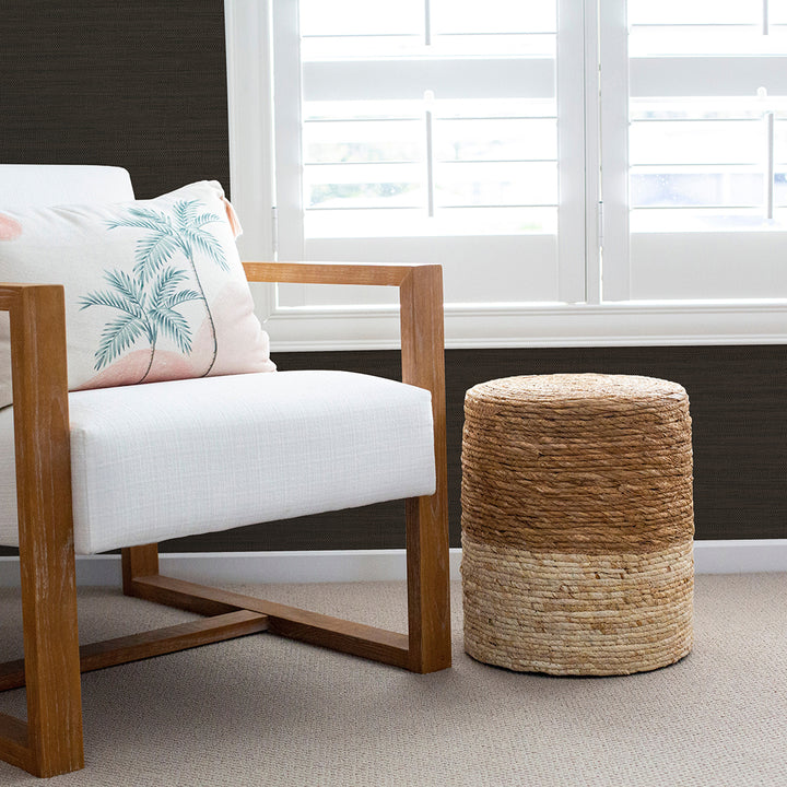 Faux Horizontal Grasscloth Removable Wallpaper - A room with a wood chair and white window featuring Faux Horizontal Grasscloth Peel And Stick Wallpaper in textured black raven | Tempaper#color_textured-black-raven