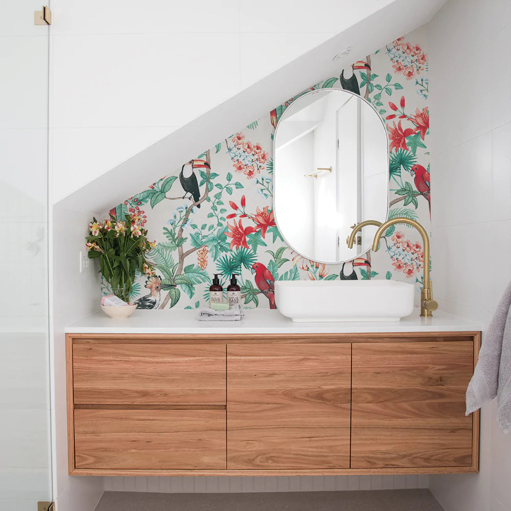 Image of a tropical peel and stick wallpaper print in a bathroom