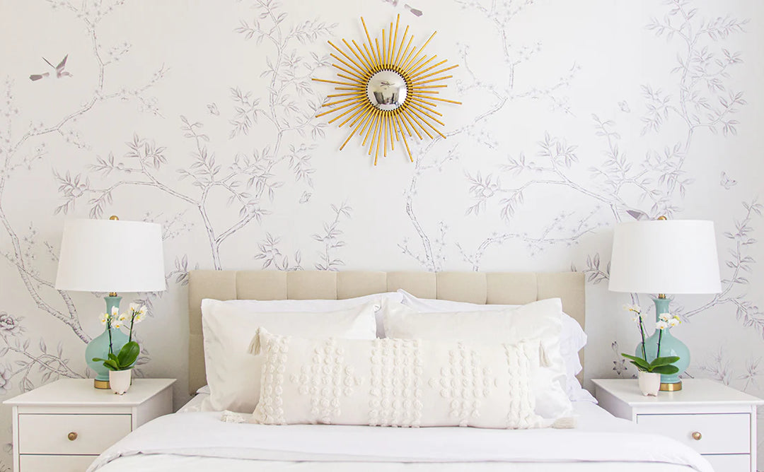 Image of Tempaper Chinoiserie Garden Dove White behind a bed with two bedside tables.