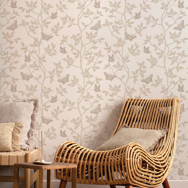 Monarch Non-Pasted Wallpaper - A tan chair in front of Monarch Unpasted Wallpaper in fawn | Tempaper#color_fawn