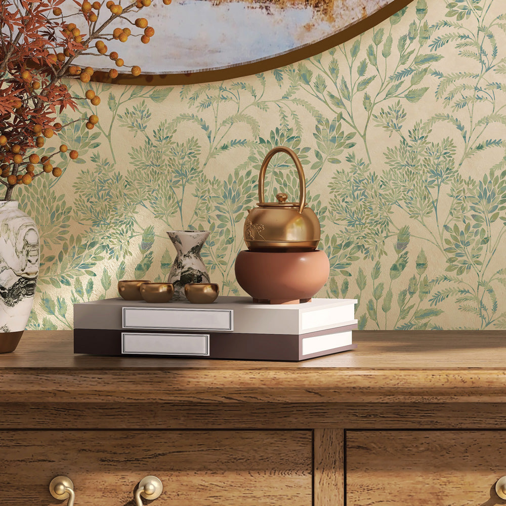 Stencil Foliage Non-Pasted Wallpaper - A wood dresser with books featuring Stencil Foliage Unpasted Wallpaper in eucalyptus | Tempaper#color_eucalyptus