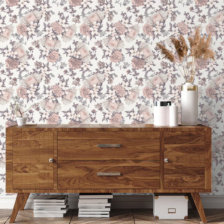 Botanical WALLPAPER displayed behind a wooden cabinet.