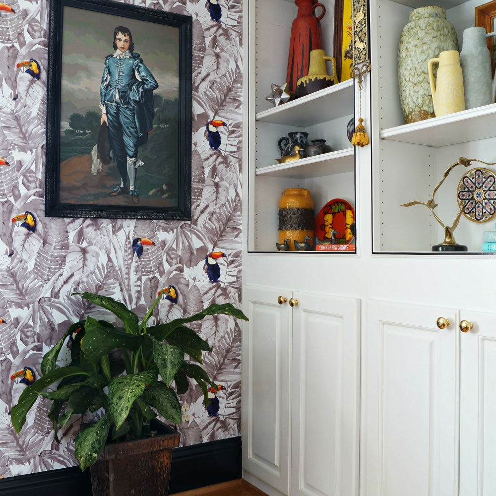 Toucan Removable Wallpaper - White shelves and cabinets and a plant in a room featuring Toucan Peel And Stick Wallpaper | Tempaper