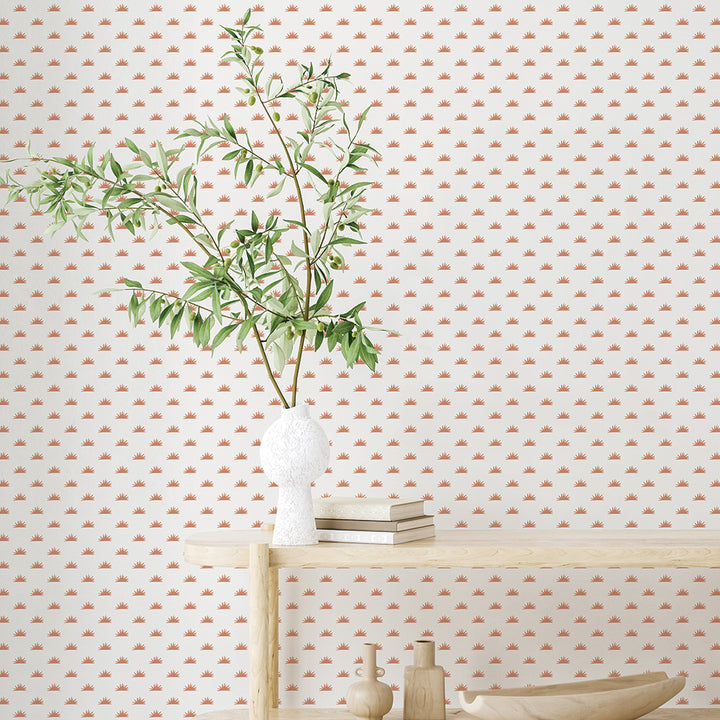 Wood shelves with a plant on top and Tempaper's Sunbeam Peel And Stick Wallpaper.