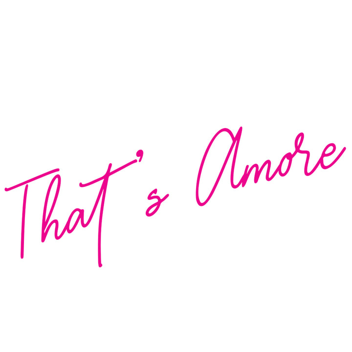 The words "That's Amore" written in hot pink cursive, available from Tempaper as the That's Amore wall decal set.